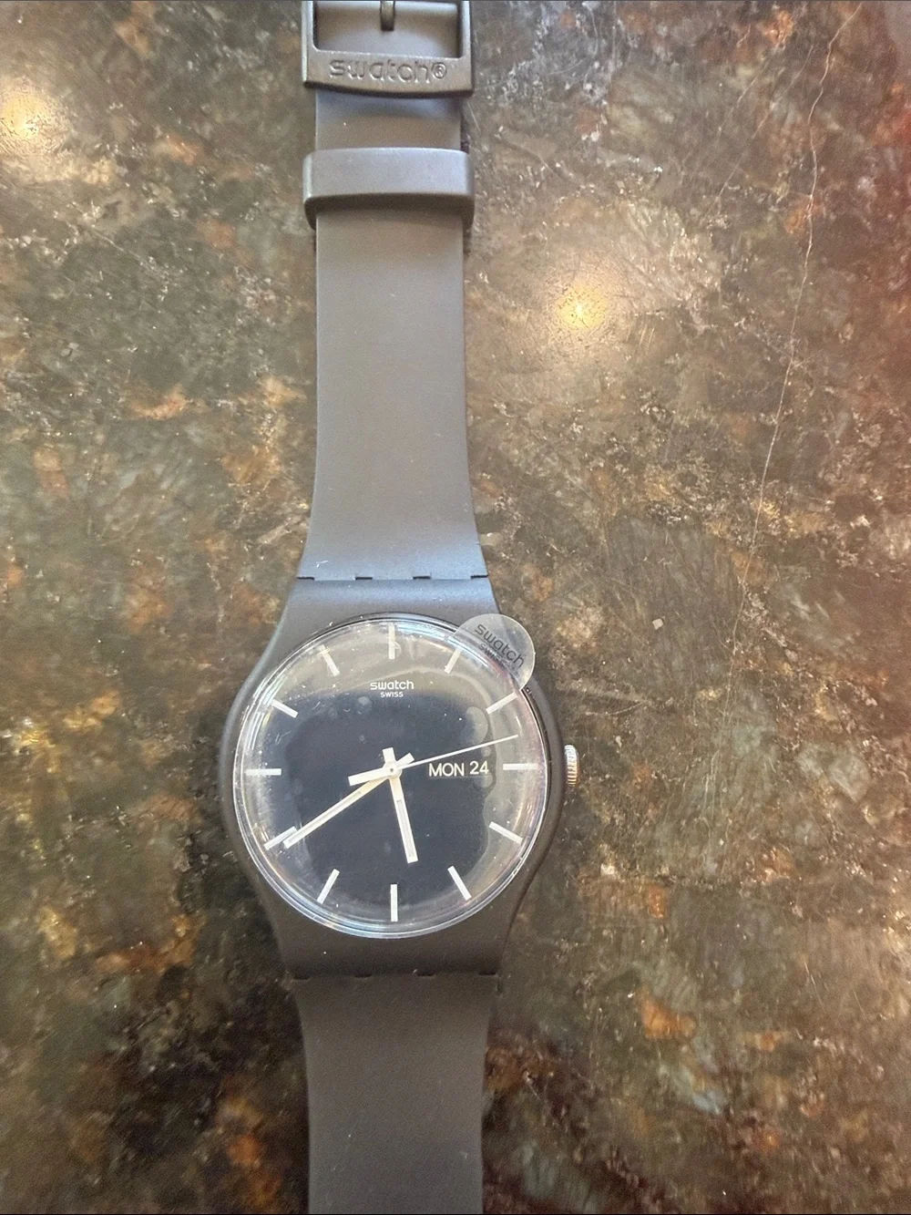 Swatch Black Silicone Strap Watch with Blackish/Grey dial.